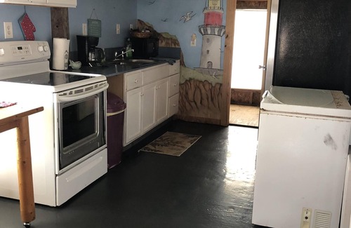 Cedar Lane Cabin | The Salty Pig Cabin On Caney Creek Sargent Tx HERO Discounts, has RV Hook Up