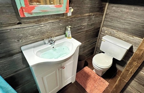 Cedar Lane Cabin | The Salty Pig Cabin On Caney Creek Sargent Tx HERO Discounts, has RV Hook Up