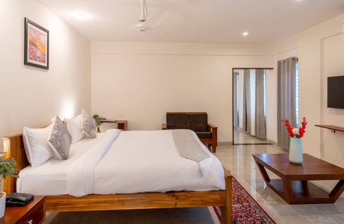 Yelahanka Hotel | The Silver Chimes Suites