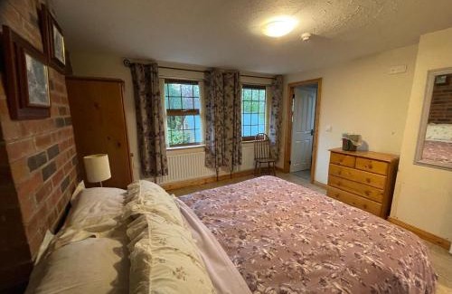 Tyrone Apartment | The Slates Apartments - Fuchsia & Orchard Apartments