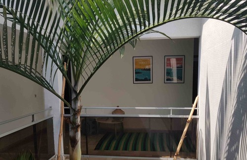 Angre House | The Smart House is a family home, in the heart of a lush garden,