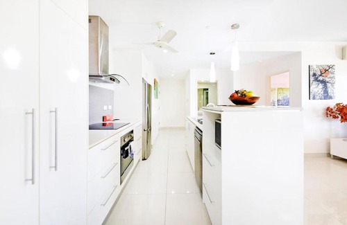 Darwin City Centre Apartment | 'The Smith' A Vibrant Poolside Balcony Haven