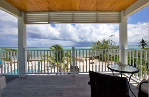 Colliers Bay Condo | The Starfish Oceanfront Studio Cottage in East End