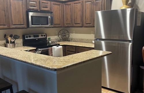 Gruene Condo | The State Haus in Gruene! Walk to Gruene Hall and much more! Tube from property