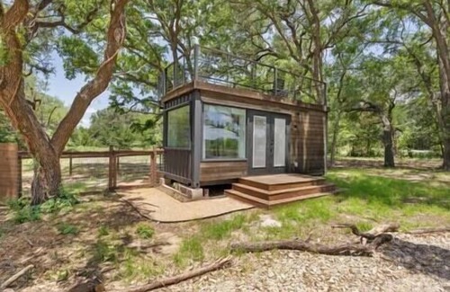 Dennis House | The Tiny 'Tainer | Tiny Shipping Container with HOT TUB