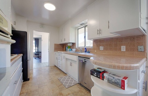 College Terrace Apartment | the tranquility of a serene stroll just two blocks from Stanford University.