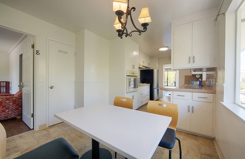 College Terrace Apartment | the tranquility of a serene stroll just two blocks from Stanford University.