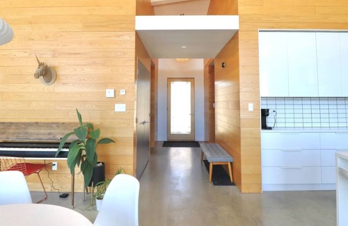 Merlin House | The Wave House | Waterfront, Pool, Sauna