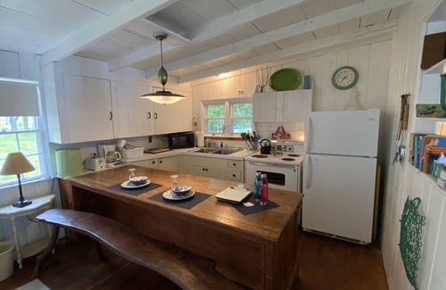West Poland Cottage | The Wee White Cottage on Tripp Lake in Poland, Maine.