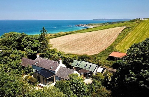 Ballycastle Cottage | The Woods at White Park Bay With a Private hot Tub. Blissful Relaxation Awaits!