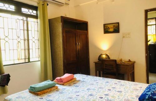 Mandrem House | The YelloMello HomeStay 1BHK fast Wi-Fi AC Pet-Friendly