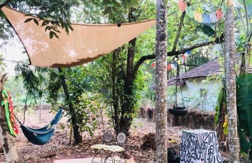 Mandrem House | The YelloMello HomeStay 1BHK fast Wi-Fi AC Pet-Friendly