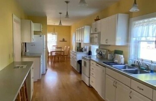 Ludington House | The Yellow House-Three bedroom within walking distance of Lake Michigan.