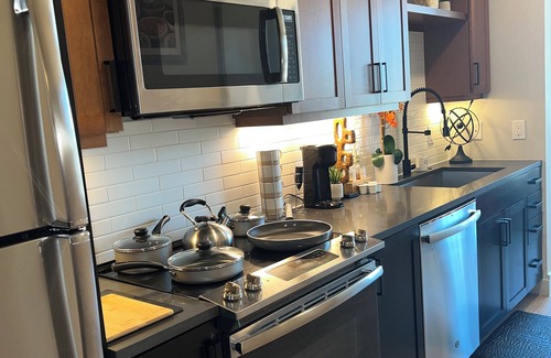 Downtown Dallas Apartment | Theatre Suite ~ City Views ~ Secret Game Room ~