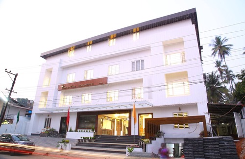 Thalassery Hotel | THEERTHA INTERNATIONAL