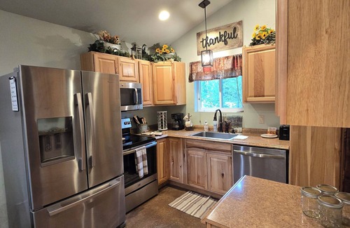 Coram Cabin | Themed Bear's Den Cabin nnestled in the pines minutes outside of Glacier Park.