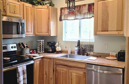 Coram Cabin | Themed Bear's Den Cabin nnestled in the pines minutes outside of Glacier Park.