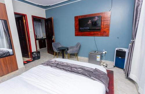 Soroti Apartment | Then Den Soroti White & Gray