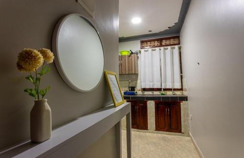 Soroti Apartment | Then Den Soroti White & Gray