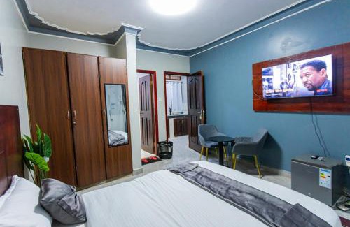 Soroti Apartment | Then Den Soroti White & Gray