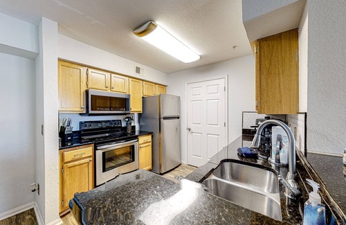 Indian Bayou Condo | Third-floor condo with balcony, pool, gym & central AC - 1/2 mile to the beach