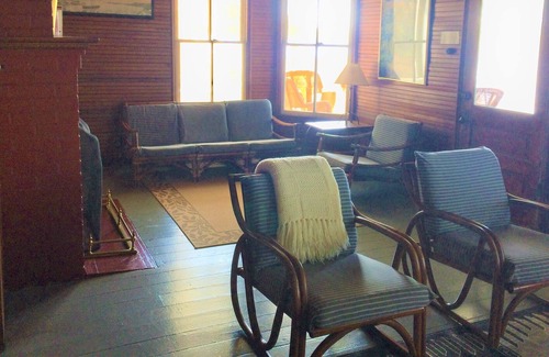 Ottawa Beach Cottage | This 1890's Cottage Has A Panoramic View Of Lake Macatawa and the Holland Harbor