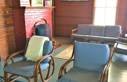 Ottawa Beach Cottage | This 1890's Cottage Has A Panoramic View Of Lake Macatawa and the Holland Harbor