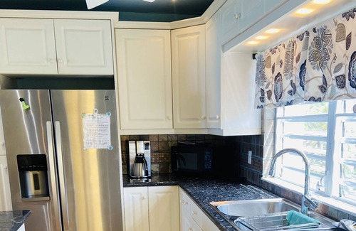 Cotton Valley Condo | This 2 BR, 2 BA condo w/ breathtaking panoramic views of the Caribbean.