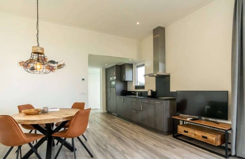 Burgh-Haamstede House | This 4-person chalet is fully equipped! It is wonderful to relax both inside on the comfortable corn