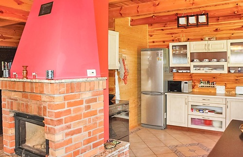gmina Wolin House | This beautiful, well-maintained wooden house is located on a large, fenced lot.