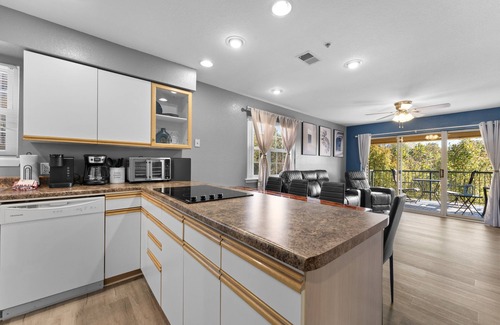 Branson Condo | This charming 2-bedroom condo offers a blend of comfort and style.