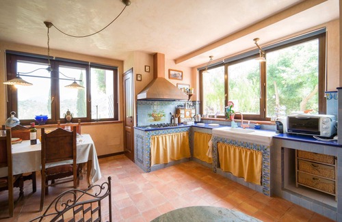 Castelbuono House | This charming vacation home is located just outside the medieval center of Castelbuono.