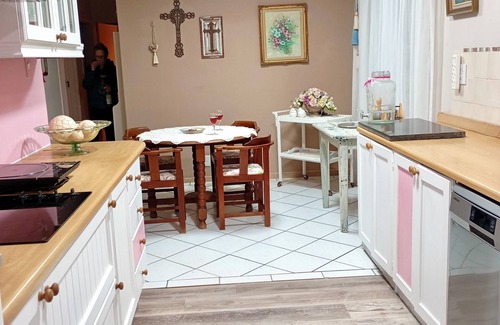 Mossel Bay House | This cozy home is nestled in a beautiful secret garden.