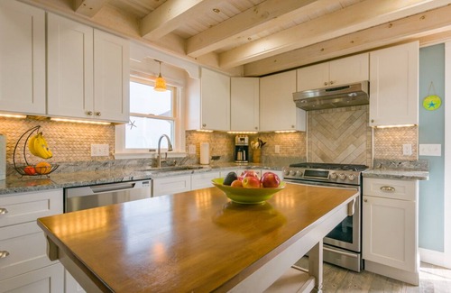 Sagamore Beach House | This enchanting cottage set atop the dunes of Sagamore Beach offers a vacation lifestyle you'll love