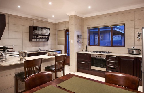 Clarens House | This holiday home has a balcony, stove top and kitchen