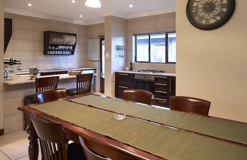 Clarens House | This holiday home has a balcony, stove top and kitchen