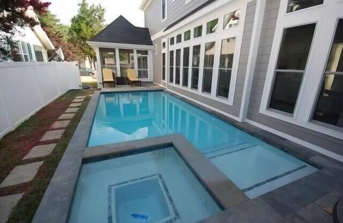 South Rehoboth House | This house is a 5 bedroom(s), 5.5 bathrooms, located in Rehoboth Beach, DE.
