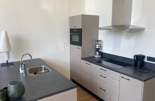 Gasselte House | This modern vacation home is the place to be. The house is suitable for four people, has two bedrooms and is completely on one level. Around the house is a spacious garden to relax in the sun.