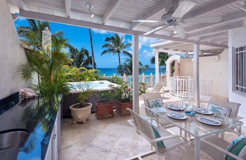 Reeds Bay Condo | This Penthouse is situated directly on a beautiful sandy beach and has a wonderful roof deck terrace