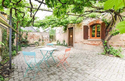 Sand House | This recently renovated house half opens onto a courtyard that you share with the owner.
