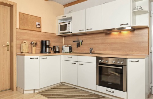 Kaltenhof House | This semi-detached holiday home is located on a plot of over 600m², fenced in wi