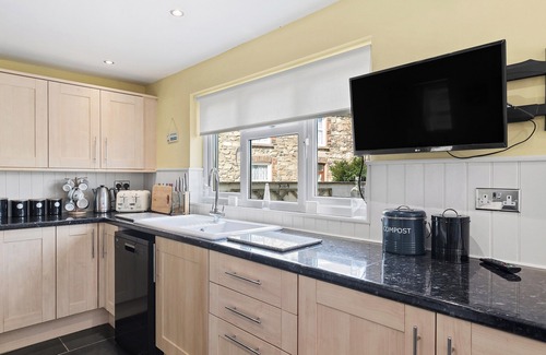 Haverfordwest Cottage | This spacious family home with glorious wood burner has all year round charm.