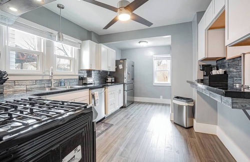 Akron House | This vintage home in Akron provides easy access to nearby cities & attractions.