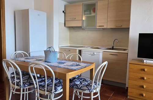 Golfo di Marinella Apartment | Three-room apartment with balcony and sea-view infinity pool in Ladunia