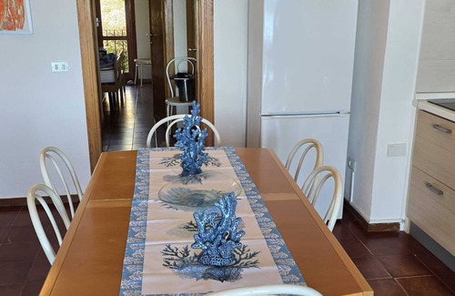 Golfo di Marinella Apartment | Three-room apartment with balcony and sea-view infinity pool in Ladunia