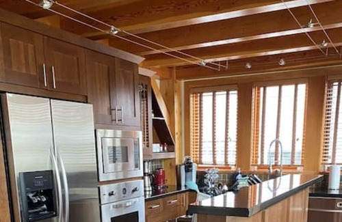 Golden Ski Chalet | Timber frame, vaulted ceiling chalet with views!