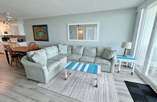 Gulf Shores Condo | Time to get… 🎶 Knee deep in the water somewhere! 🎶 on island time!