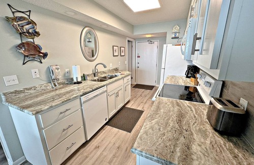 Gulf Shores Condo | Time to get… 🎶 Knee deep in the water somewhere! 🎶 on island time!