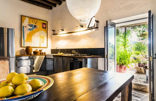 Sant Joan de Labritja Villa | "Timeless Ibiza Haven: Designer Countryside Escape by the sea “n
