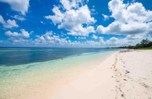 North Side House | Timmys Place - Charming Oceanfront Villa with Direct Beach Access and Scenic Views